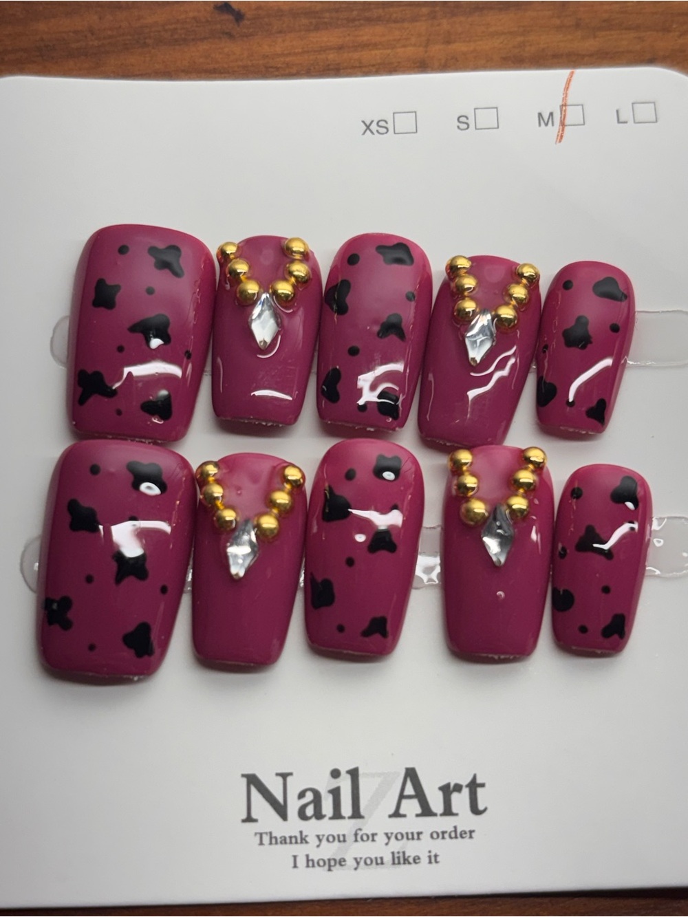 Glam Berry Pink Press-On Nails with Black Spots and Gold Accent